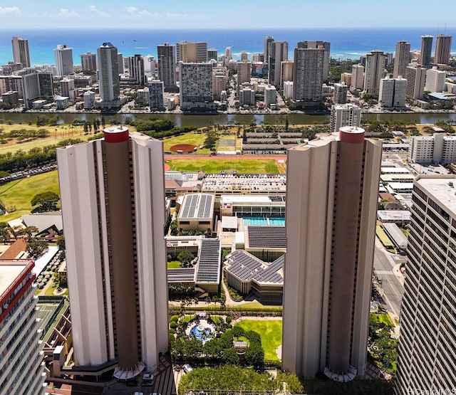 view of urban area featuring a large body of water