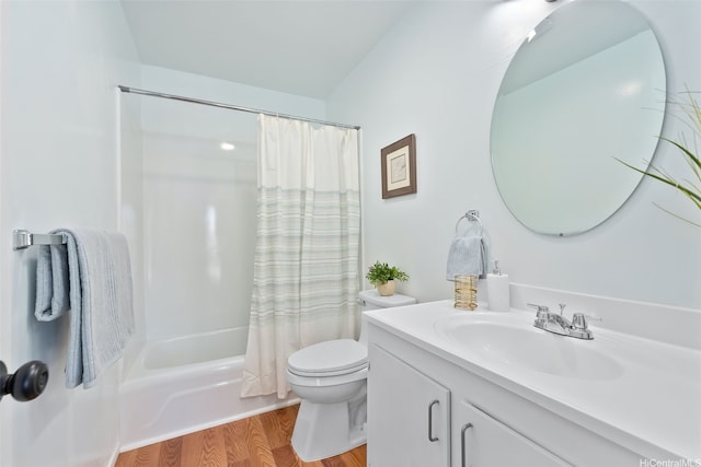 214 Koko Isle Cir Unit 1707, Honolulu, HI 96825 - full bathroom featuring toilet, wood finished floors, shower / tub combo with curtain, and vanity