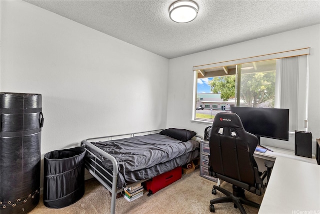 95-1049 Kuauli St Unit 49, Mililani, HI 96789 - bedroom with carpet flooring, a textured ceiling, and a desk