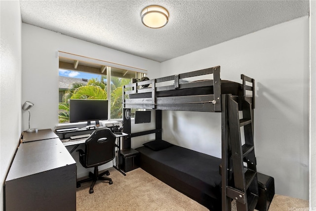 95-1049 Kuauli St Unit 49, Mililani, HI 96789 - bedroom with light colored carpet, a textured ceiling, and an office area