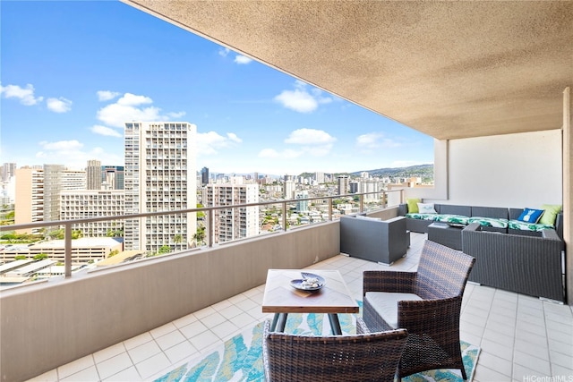 581 Kamoku St Unit 2408, Honolulu, HI 96826 - balcony featuring a view of city and outdoor lounge area