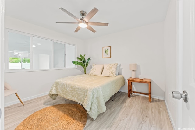 47-599 Alawiki St, Kaneohe, HI 96744 - bedroom with wood finished floors, baseboards, and ceiling fan