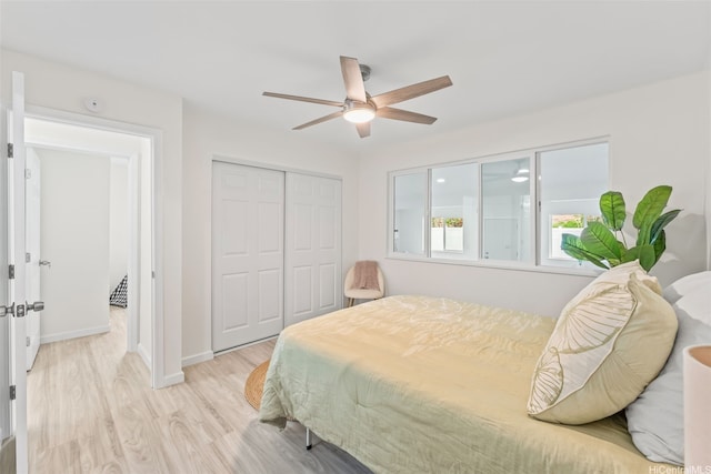 47-599 Alawiki St, Kaneohe, HI 96744 - bedroom featuring light wood-type flooring, a closet, baseboards, and ceiling fan