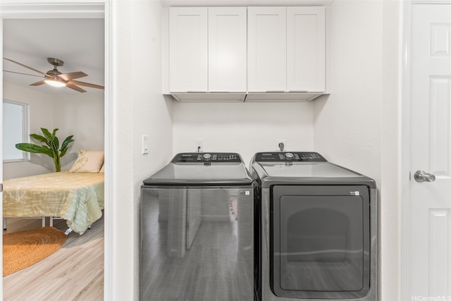 47-599 Alawiki St, Kaneohe, HI 96744 - clothes washing area with cabinet space, washing machine and dryer, wood finished floors, and a ceiling fan