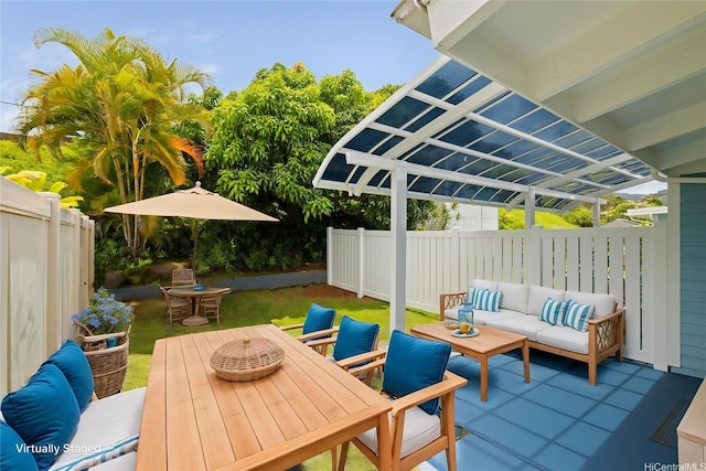 view of patio / terrace with an outdoor hangout area, a fenced backyard, and outdoor dining space