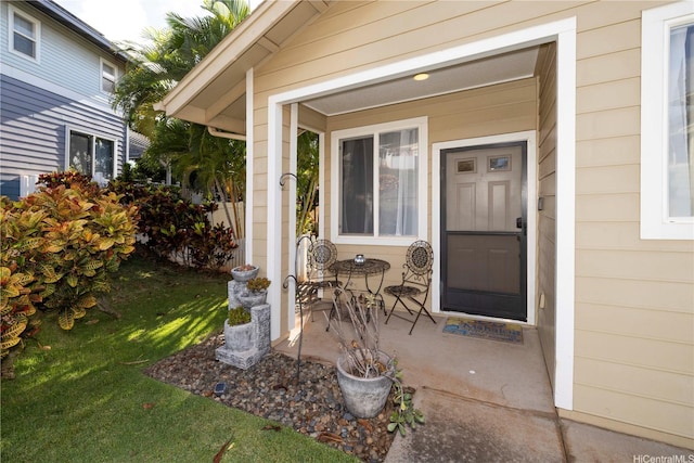 92-7049 Elele St Unit 29, Kapolei, HI 96707 - doorway to property with a lawn and covered porch
