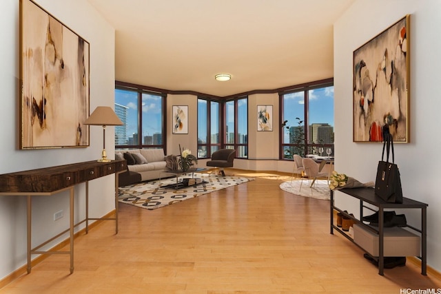 725 Kapiolani Blvd Unit 2901, Honolulu, HI 96813 - living room with floor to ceiling windows and wood finished floors
