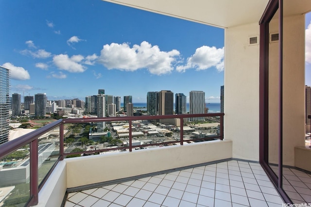 725 Kapiolani Blvd Unit 2901, Honolulu, HI 96813 - balcony featuring a view of skyline and a water view