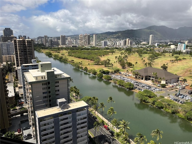 view of urban area with a large body of water