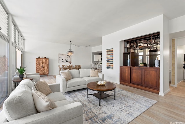 500 University Ave Unit Ph6, Honolulu, HI 96826 - living area featuring light wood-type flooring and baseboards