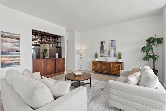 500 University Ave Unit Ph6, Honolulu, HI 96826 - living area featuring light wood-style flooring and baseboards