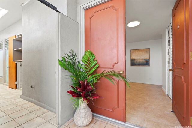 500 University Ave Unit Ph6, Honolulu, HI 96826 - corridor featuring a skylight and light tile patterned flooring