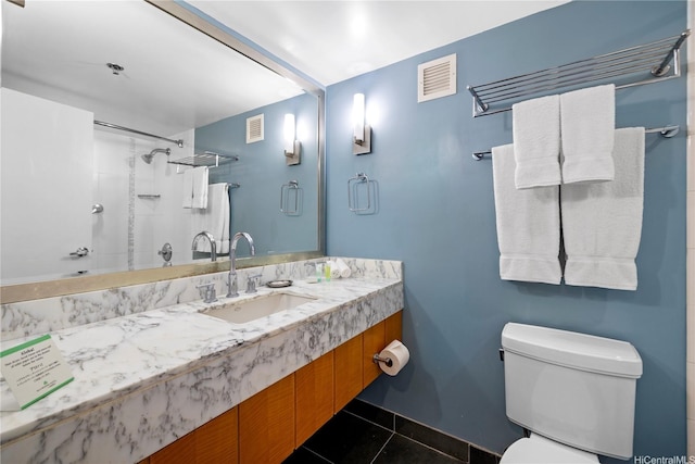 410 Atkinson Dr Unit 1616, Honolulu, HI 96814 - bathroom with toilet, a shower, tile patterned floors, and vanity