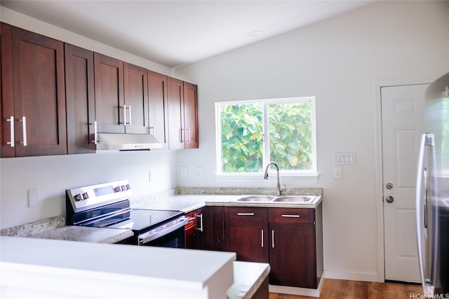 87-1026 Nenewai St, Waianae, HI 96792 - kitchen with appliances with stainless steel finishes, under cabinet range hood, and light countertops