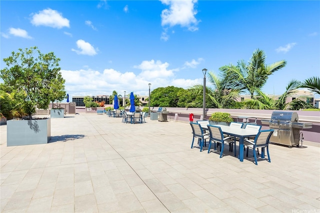 425 S St Unit 403, Honolulu, HI 96813 - view of patio / terrace featuring a grill and outdoor dining area