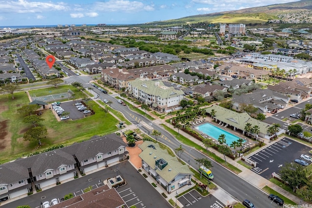 aerial view of property's location featuring a pool area