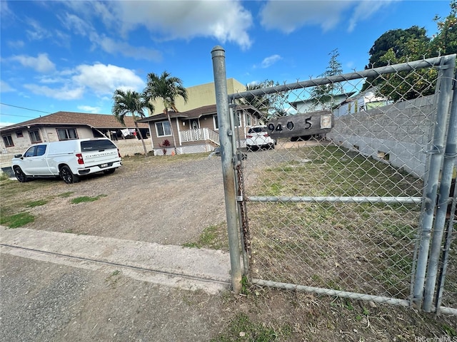 94-065 Waipahu Depot St Unit F, Waipahu, HI 96797 - view of front of home featuring fence