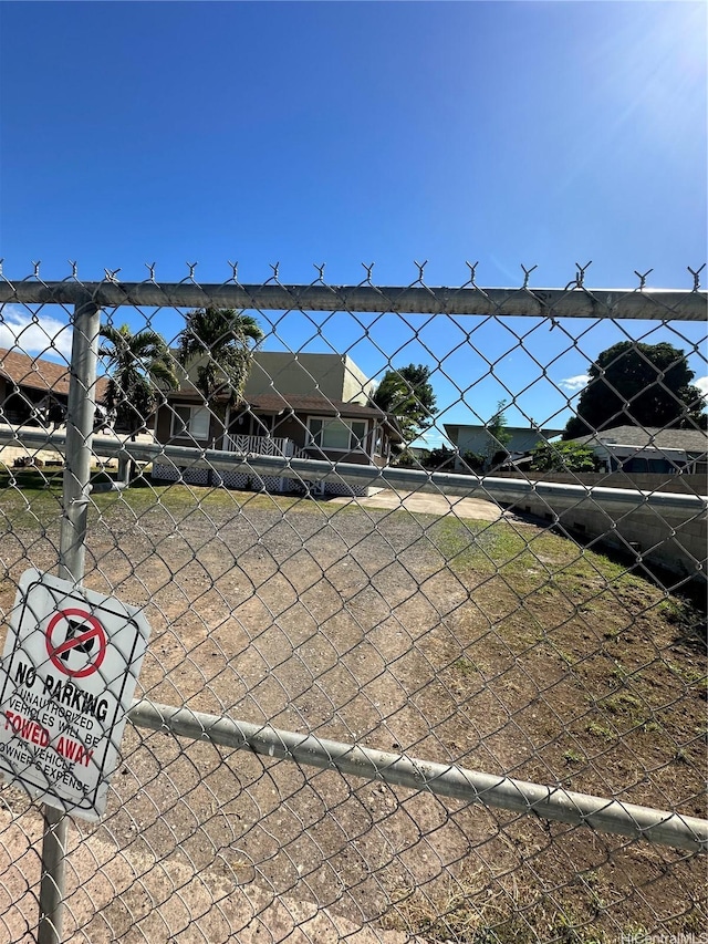 94-065 Waipahu Depot St Unit F, Waipahu, HI 96797 - view of tennis court with fence