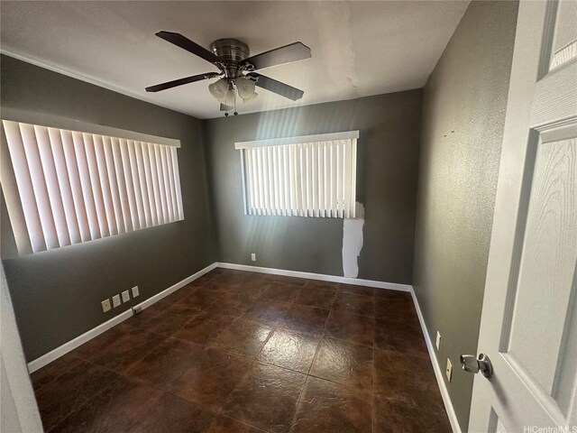 94-065 Waipahu Depot St Unit F, Waipahu, HI 96797 - spare room with baseboards and a ceiling fan