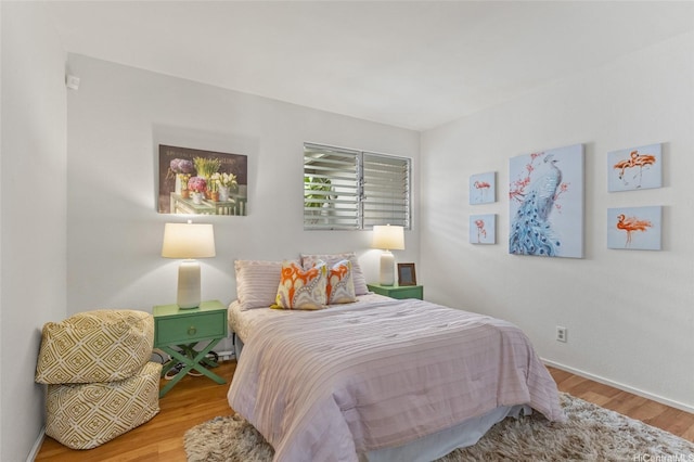 98-533 Kipaepae St Unit 104, Aiea, HI 96701 - bedroom with wood finished floors and baseboards