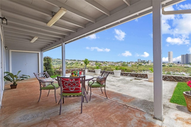 98-533 Kipaepae St Unit 104, Aiea, HI 96701 - view of patio / terrace featuring outdoor dining area and a city view