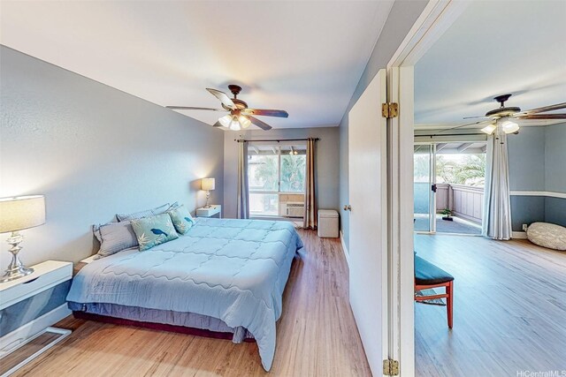 91-1180 Mikohu St Unit 41U, Ewa Beach, HI 96706 - bedroom featuring wood finished floors, baseboards, a ceiling fan, and access to outside