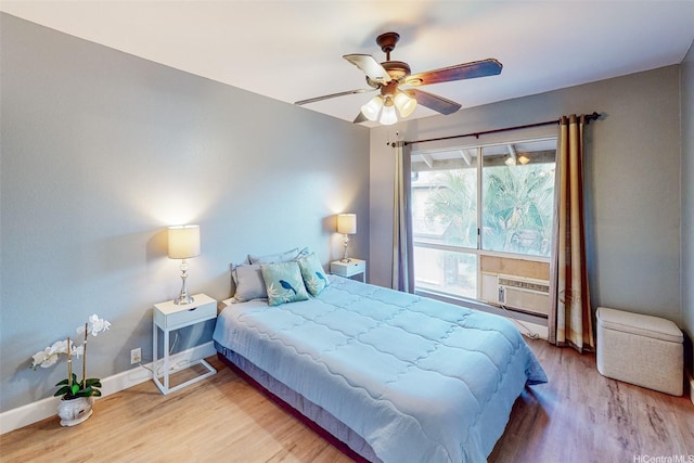 91-1180 Mikohu St Unit 41U, Ewa Beach, HI 96706 - bedroom featuring wood finished floors, baseboards, and a ceiling fan