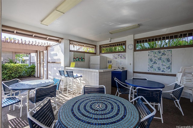 91-1180 Mikohu St Unit 41U, Ewa Beach, HI 96706 - view of patio / terrace featuring outdoor dining area and a pergola