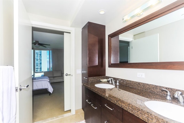 1837 Kalakaua Ave Unit 1102, Honolulu, HI 96815 - full bath featuring connected bathroom, double vanity, tile patterned floors, and a ceiling fan