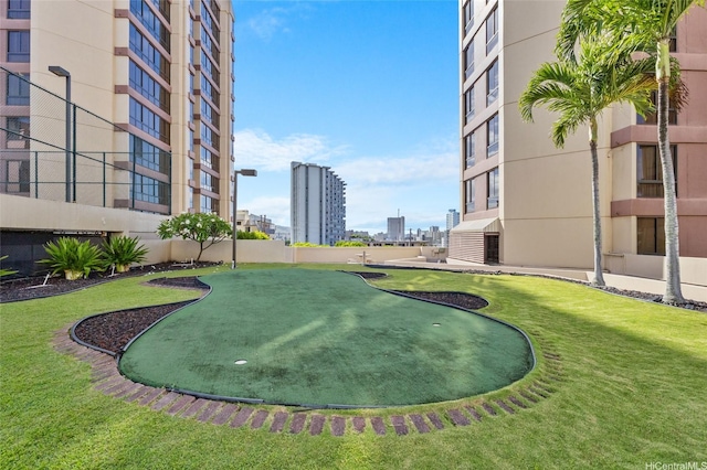 1040 Lunalilo St Unit 706, Honolulu, HI 96822 - view of property's community with a city view and a putting area