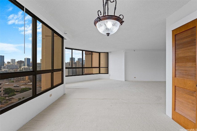 1040 Lunalilo St Unit 706, Honolulu, HI 96822 - carpeted empty room featuring a skyline view