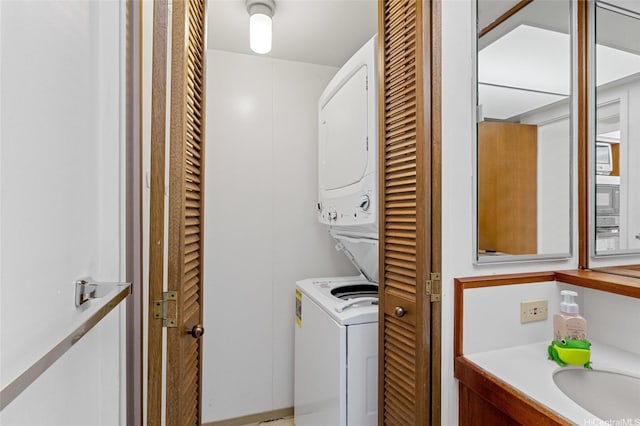 1040 Lunalilo St Unit 706, Honolulu, HI 96822 - laundry room featuring estacked washer and dryer and a sink