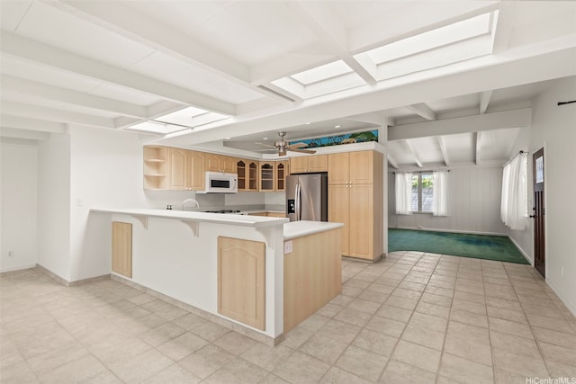 622 Pamaele St, Kailua, HI 96734 - kitchen featuring stainless steel fridge with ice dispenser, white microwave, a peninsula, a ceiling fan, and open shelves
