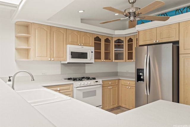 622 Pamaele St, Kailua, HI 96734 - kitchen featuring white appliances, light brown cabinets, a sink, light countertops, and recessed lighting