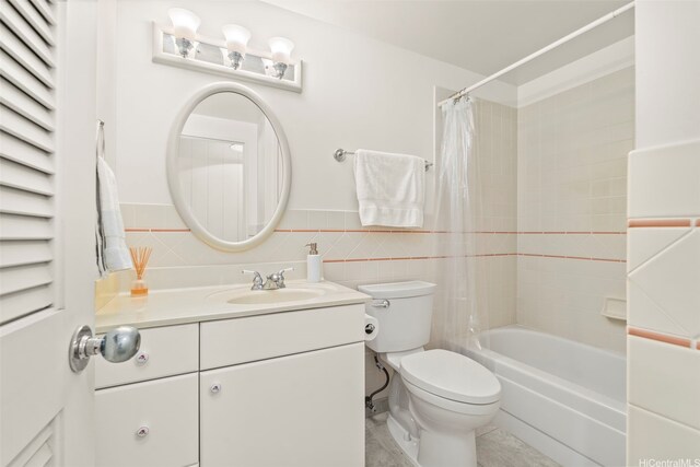 622 Pamaele St, Kailua, HI 96734 - bathroom featuring toilet, vanity, shower / bath combination with curtain, decorative backsplash, and tile walls