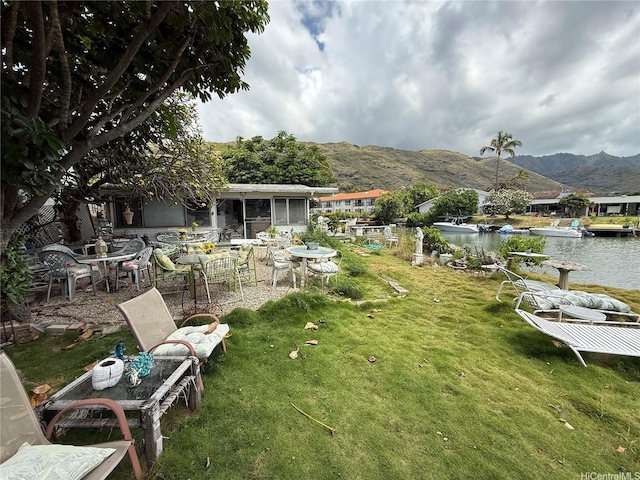 6254 Kawaihae Pl Unit C, Honolulu, HI 96825 - view of grassy yard featuring a water and mountain view and a sunroom