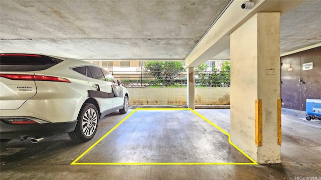 2122 Lime St Unit 307, Honolulu, HI 96826 - parking garage featuring fence