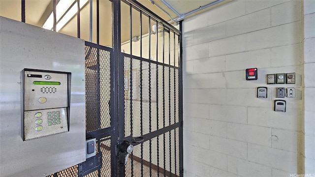 2122 Lime St Unit 307, Honolulu, HI 96826 - elevator featuring concrete block wall