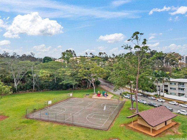 95-014 Waihonu St Unit E204, Mililani, HI 96789 - view of sport court with a lawn, community basketball court, and view of wooded area