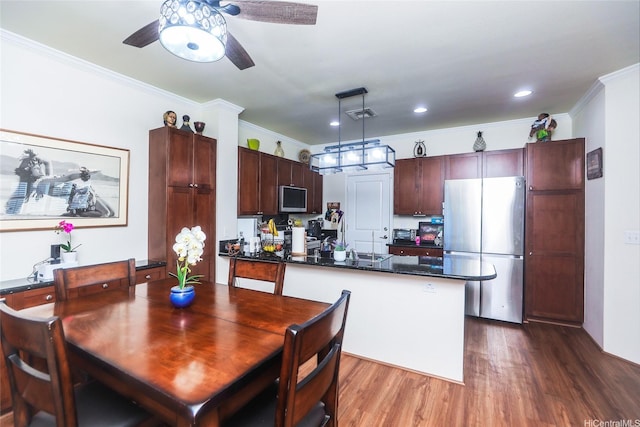 91-1173 Pekau St, Ewa Beach, HI 96706 - dining room with a ceiling fan, crown molding, dark wood-style flooring, and recessed lighting