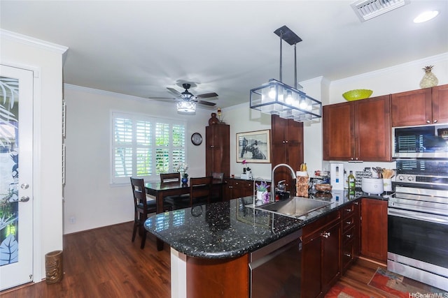 91-1173 Pekau St, Ewa Beach, HI 96706 - kitchen featuring appliances with stainless steel finishes, a sink, dark wood-style floors, a peninsula, and a ceiling fan