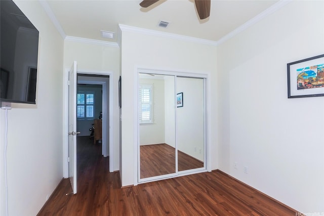 91-1173 Pekau St, Ewa Beach, HI 96706 - unfurnished bedroom with wood finished floors, ornamental molding, a closet, and a ceiling fan
