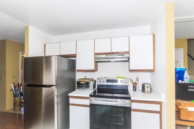47-766 Kamehameha Hwy, Kaneohe, HI 96744 - kitchen with stainless steel appliances, under cabinet range hood, white cabinets, light countertops, and a textured ceiling