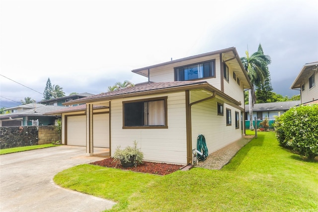 47-766 Kamehameha Hwy, Kaneohe, HI 96744 - view of front of home with concrete driveway and an attached garage
