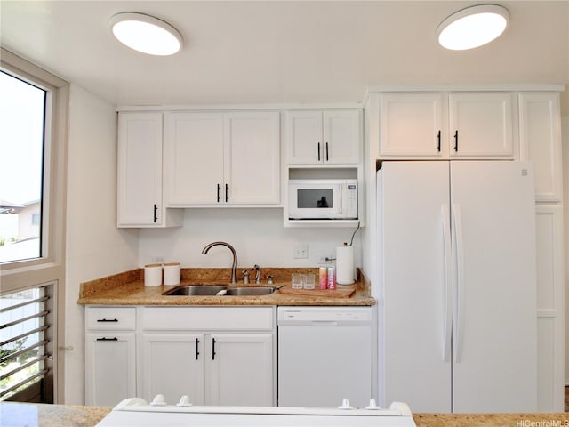 68-090 Au St Unit E312, Waialua, HI 96791 - kitchen with white appliances, a sink, white cabinets, and light stone counters