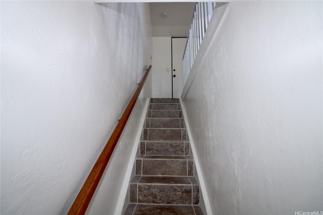 68-090 Au St Unit E312, Waialua, HI 96791 - staircase featuring stone tile floors