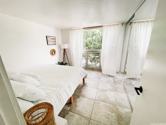 68-090 Au St Unit E312, Waialua, HI 96791 - bedroom with tile patterned flooring