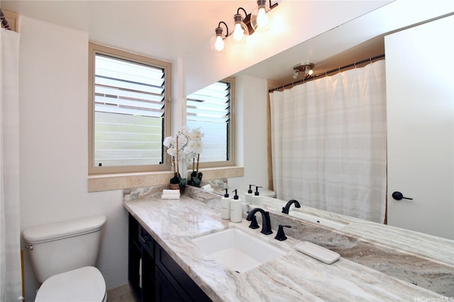 68-090 Au St Unit E312, Waialua, HI 96791 - bathroom featuring toilet and vanity