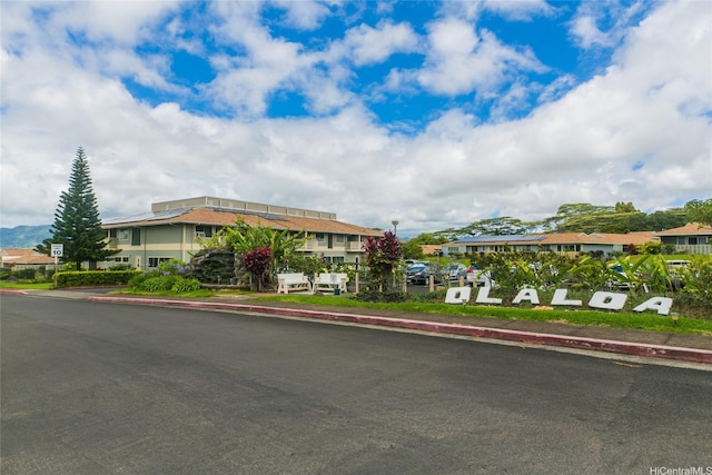 95-1050 Makaikai St Unit 23D, Mililani, HI 96789 - view of building exterior with a residential view