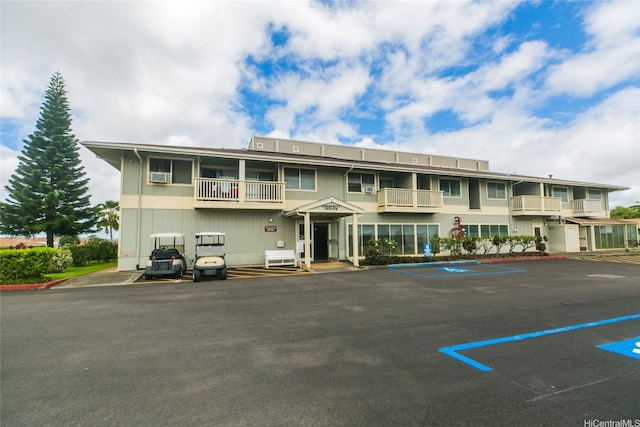 95-1050 Makaikai St Unit 23D, Mililani, HI 96789 - view of building exterior with uncovered parking